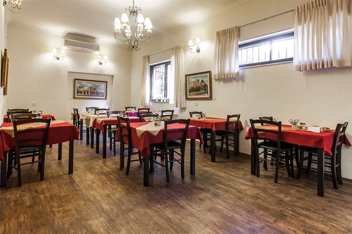 Imagen del bar/restaurante del Little House In Rehavia. Foto 2