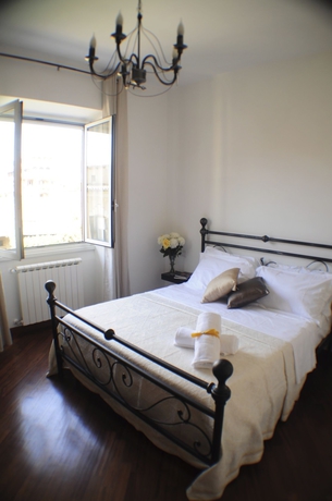 Imagen de la habitación del Little Rhome Suites. Foto 7