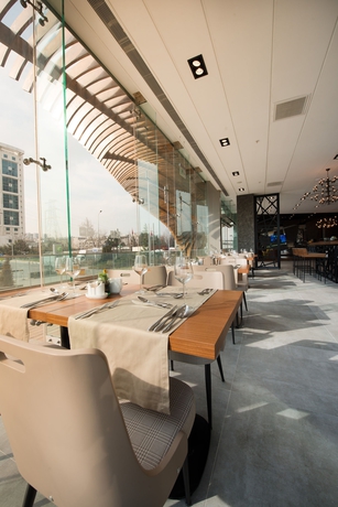 Imagen del bar/restaurante del Liv City Hotels. Foto 5