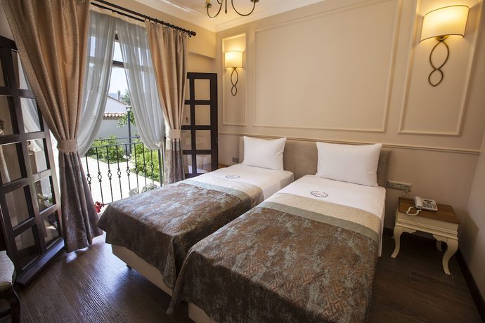 Imagen de la habitación del Livia Garden Hotel. Foto 7