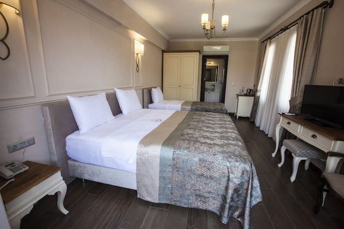 Imagen de la habitación del Livia Garden Hotel. Foto 8