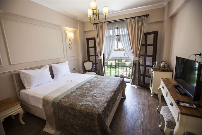 Imagen de la habitación del Livia Garden Hotel. Foto 10