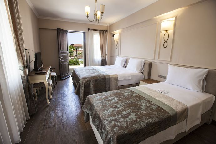 Imagen de la habitación del Livia Garden Hotel. Foto 15