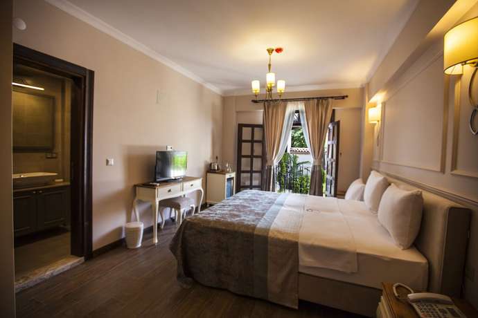 Imagen de la habitación del Livia Garden Hotel. Foto 17
