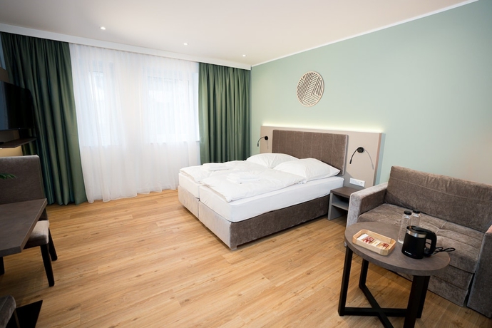 Imagen de la habitación del Living Inn. Foto 2