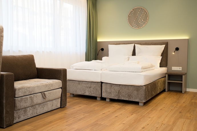 Imagen de la habitación del Living Inn. Foto 9