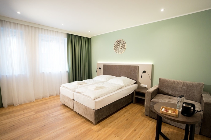 Imagen de la habitación del Living Inn. Foto 12