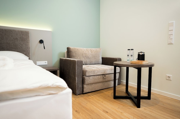 Imagen de la habitación del Living Inn. Foto 13