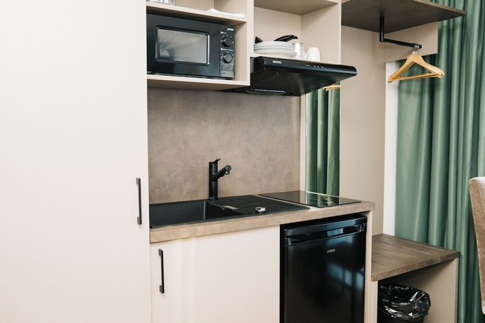 Imagen de la habitación del Living Inn. Foto 14