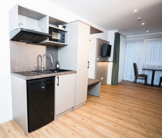 Imagen de la habitación del Living Inn. Foto 16