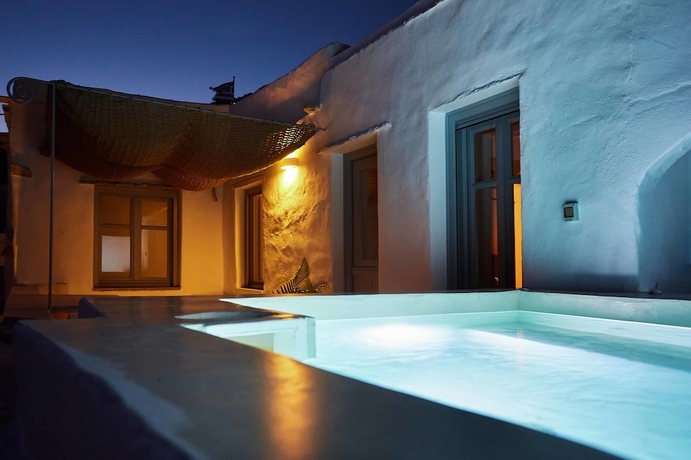 Imagen de la habitación del Living Theros Luxury Suites. Foto 2