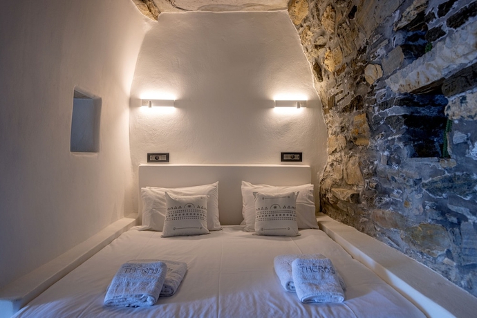 Imagen de la habitación del Living Theros Luxury Suites. Foto 5
