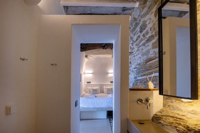 Imagen de la habitación del Living Theros Luxury Suites. Foto 6