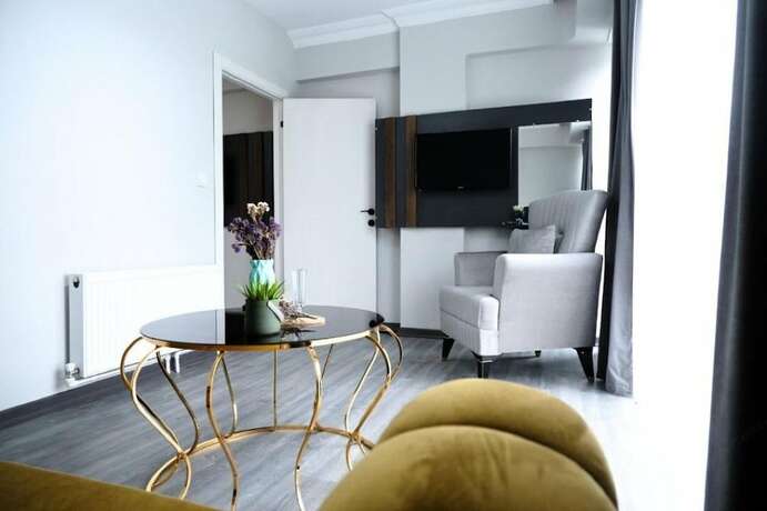 Imagen de la habitación del Liza Suit Hotel. Foto 15