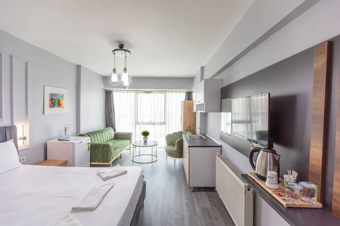 Imagen de la habitación del Liza Suit Hotel. Foto 16
