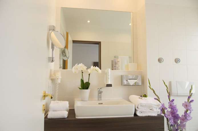 Imagen de la habitación del Lizz Hotel Munich. Foto 6