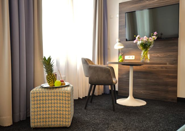 Imagen de la habitación del Lizz Hotel Munich. Foto 14