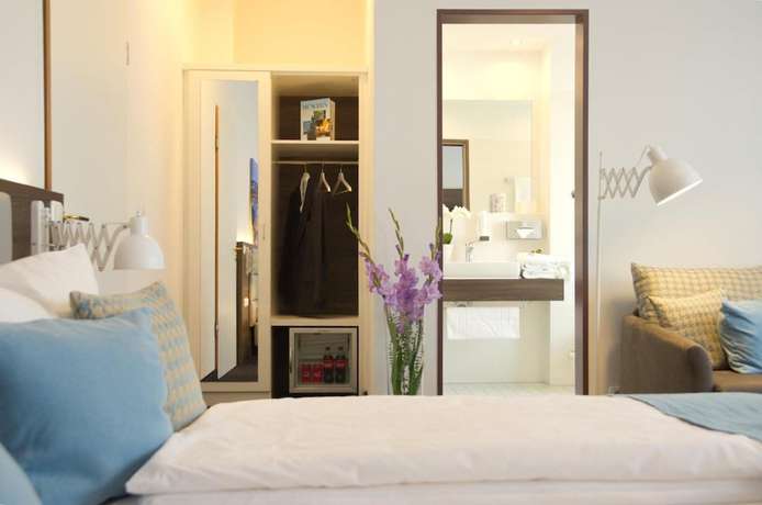 Imagen de la habitación del Lizz Hotel Munich. Foto 18