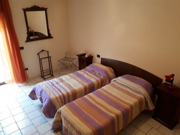 Imagen de la habitación del Lo Scoiattolo, Castellafiume. Foto 16