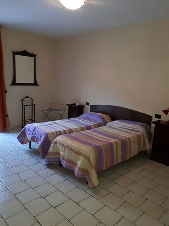 Imagen de la habitación del Lo Scoiattolo, Castellafiume. Foto 17