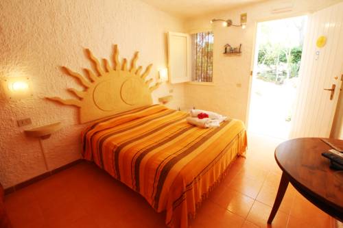 Imagen de la habitación del L'oasi Villaggio Albergo. Foto 4