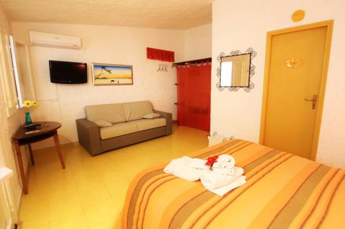 Imagen de la habitación del L'oasi Villaggio Albergo. Foto 9
