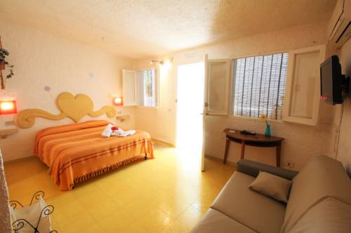 Imagen de la habitación del L'oasi Villaggio Albergo. Foto 10