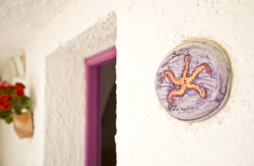 Imagen de la habitación del L'oasi Villaggio Albergo. Foto 12