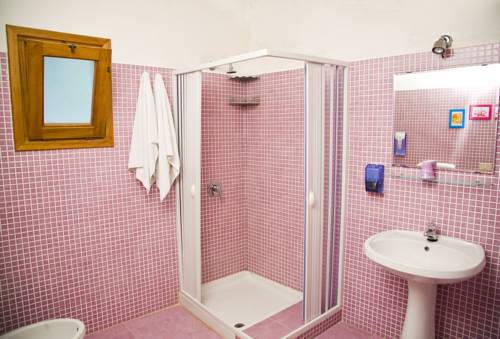Imagen de la habitación del L'oasi Villaggio Albergo. Foto 13