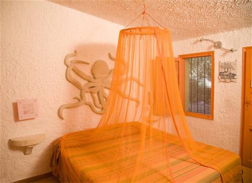 Imagen de la habitación del L'oasi Villaggio Albergo. Foto 16