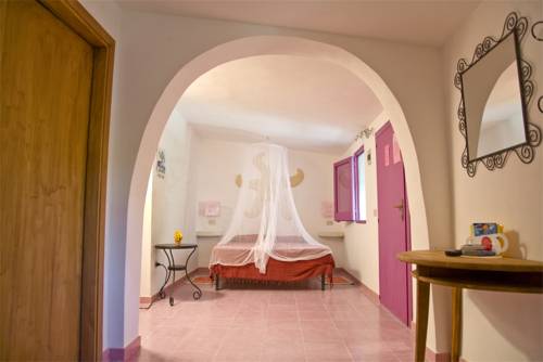 Imagen de la habitación del L'oasi Villaggio Albergo. Foto 18