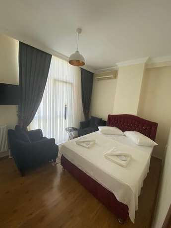 Imagen de la habitación del Loca Suit Otel. Foto 2
