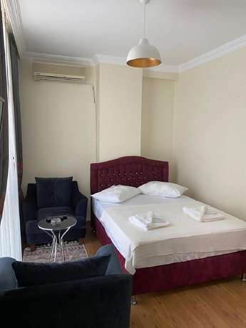Imagen de la habitación del Loca Suit Otel. Foto 4