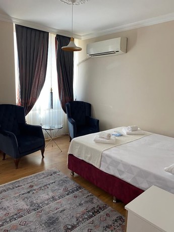 Imagen de la habitación del Loca Suit Otel. Foto 6