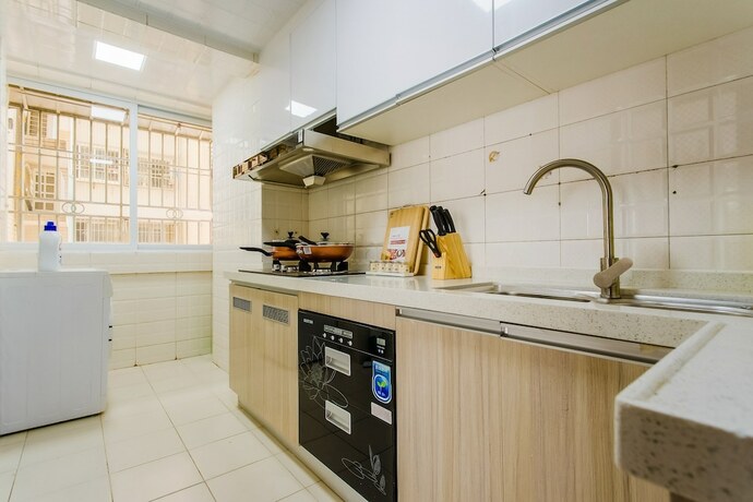 Imagen de la habitación del Locals Boutique Apartment Jiuzhou Port.3. Foto 25