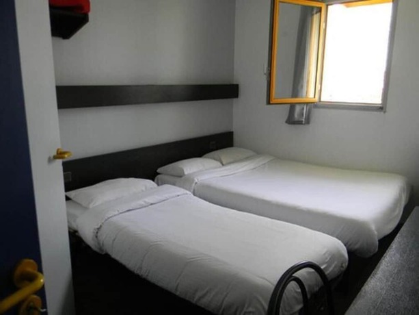 Imagen de la habitación del Logis H&ocirc;tel AMBROISE. Foto 4