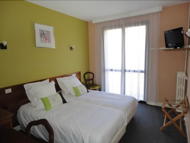 Imagen de la habitación del Logis H&ocirc;tel AMBROISE. Foto 9