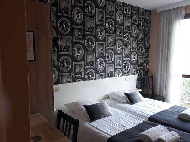 Imagen de la habitación del Logis H&ocirc;tel AMBROISE. Foto 10