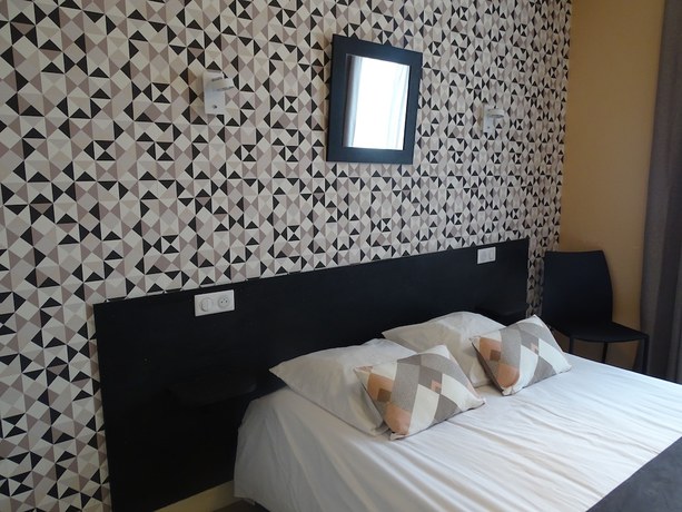 Imagen de la habitación del Logis H&ocirc;tel AMBROISE. Foto 11