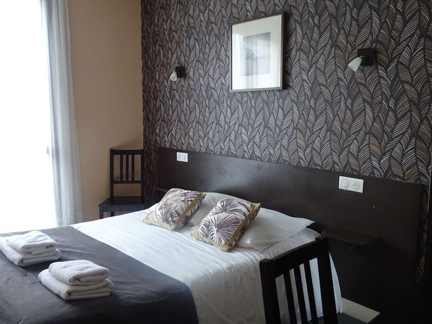 Imagen de la habitación del Logis H&ocirc;tel AMBROISE. Foto 13