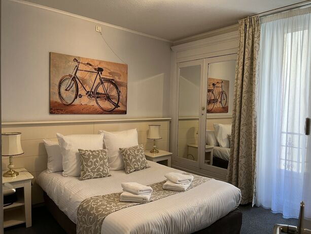 Imagen de la habitación del Logis H&ocirc;tel Belle Etoile Vichy. Foto 20