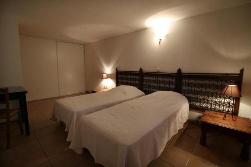 Imagen de la habitación del Logis H&ocirc;tel Restaurant G&icirc;te La Bastide du V&eacute;bron. Foto 6