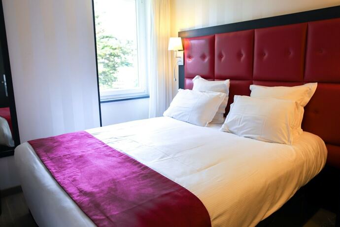 Imagen de la habitación del Logis H&ocirc;tel Saint-Guirec et de la Plage. Foto 18