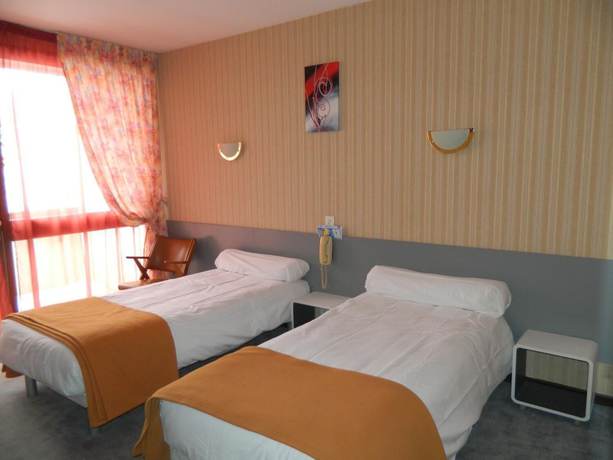 Imagen de la habitación del Logis H&ocirc;tel l\'Elanc&egrave;ze. Foto 8
