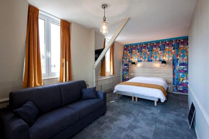 Imagen de la habitación del Logis Hostellerie Du Marche. Foto 8