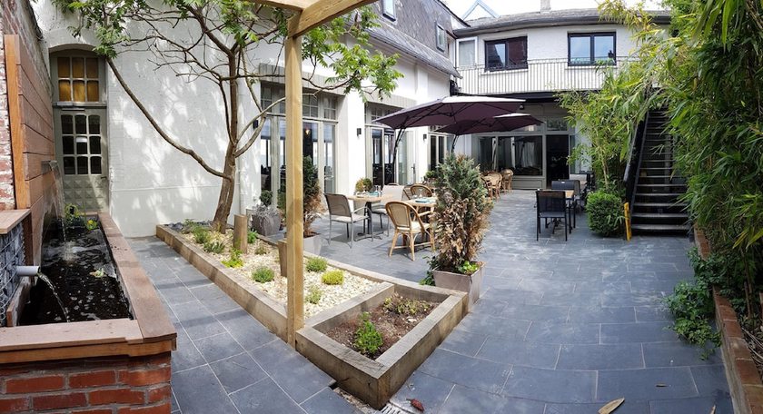 Imagen de los exteriores del Logis Hostellerie Du Marche. Foto 10