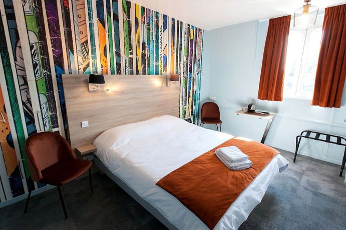 Imagen de la habitación del Logis Hostellerie Du Marche. Foto 9