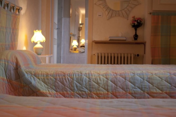 Imagen de la habitación del Logis Hotel Les Tilleuls. Foto 4