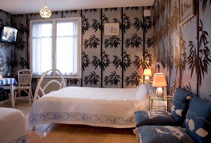 Imagen de la habitación del Logis Hotel Les Tilleuls. Foto 9