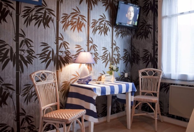 Imagen de la habitación del Logis Hotel Les Tilleuls. Foto 10